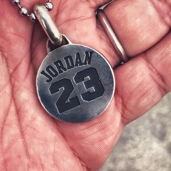 Michael Jordan Necklace stands as a beacon of style resilience and triumph
